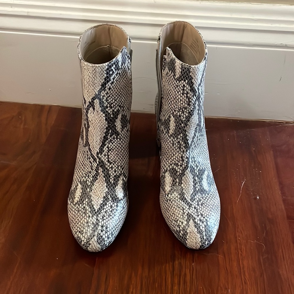 Never been worn Able heeled snake skin boots. Size 7.5
